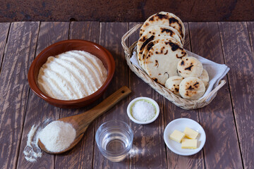 Ingredients to prepare corn arepas in Colombia
