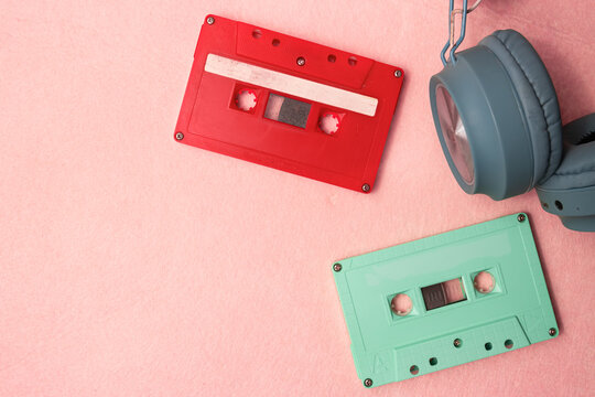 Retro green and red audio cassette tape and headphones