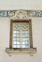 Old window on facade with tiles, Rio, Brazil