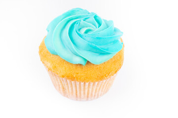 Cupcake with cream isolated on white