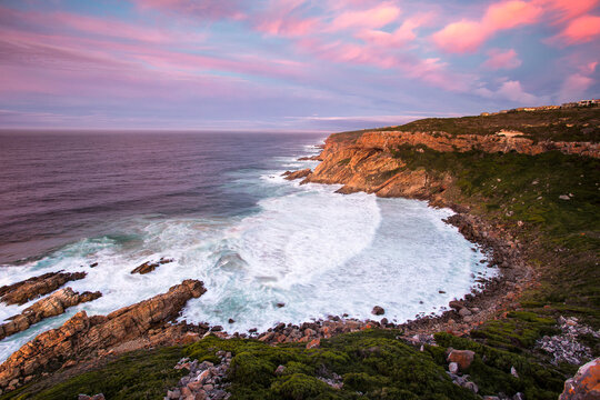 Wide angle view of dan light over the cliffs of the Oyster Catcher Trail in Mosselbay in the Garden Route in the Western Cape of South Africa