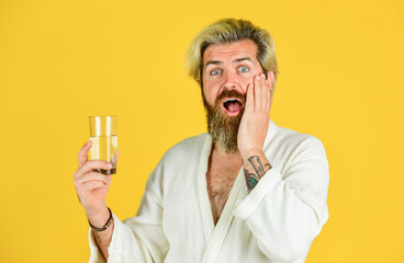 Sip of mineral water. Bearded man enjoy morning routine. Crystal clear water. Healthy habits....
