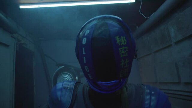 Cyberpunk concept, future world. Police officer halfman bionic cyborg or android with weapon gun in hand at night. Science fiction scene, fantasy, sci. Neon lighting. Smoke in the corridor