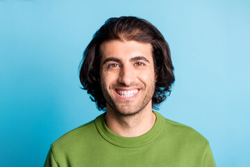 Fototapeta premium Close up photo of delighted bearded person smile look camera wear pullover isolated on blue color background