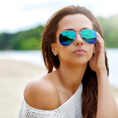 Closeup fashion beautiful woman portrait wearing sunglasses.