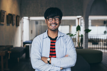 portrait young asian man wear eye glasses Smiling cheerful look thinking position with perfect...