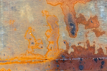 Old metal surface background with rusty stains