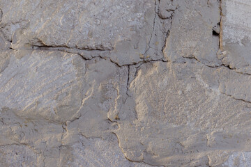 Wall from cement and stone pattern. Abstract texture. Symbol of construction.