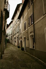 Beautiful empty silent abandoned streets of old ancient beautiful city. Classic medieval stone buildings and houses. 
