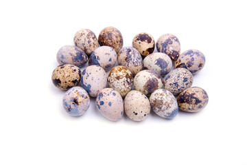 Obraz premium Quail eggs, close-up on a white background, copy space,