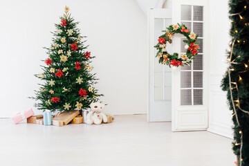 Christmas tree pine with gifts for the new year decor interior red white