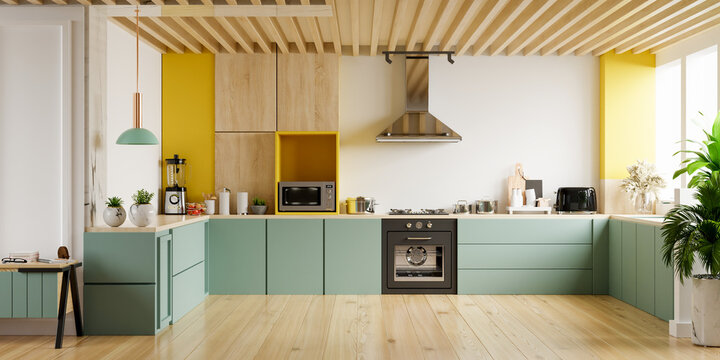 Modern kitchen interior with furniture.Stylish kitchen interior with yellow wall.
