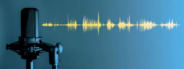 Microphone with yellow waveform on blue background, broadcasting or podcasting banner