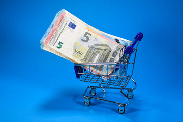 euro argent affaires business finances caddie poussette courses supermarché magasin achat