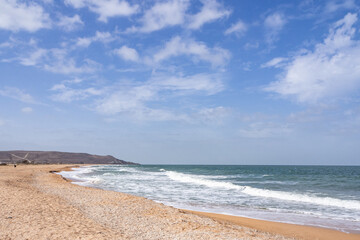 The storm and the waves of the sea. Sandy beach. Vacation, vacation,