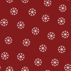 Seamless pattern of snowflakes in flat style on a red background.