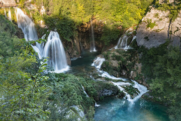 Majestic view of waterfall with crystal clear water in forest in The Plitvice Lakes National Park in Croatia Europe.