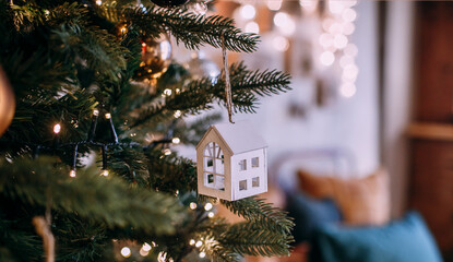 christmas toy wooden house hanging on tree