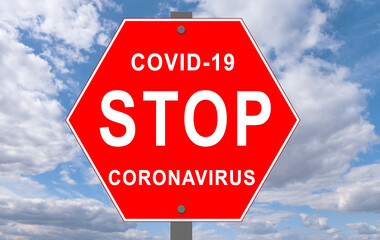 Sign STOP with words coronavirus and covid-19