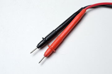 electric tester and terminal block on a white background close-up.