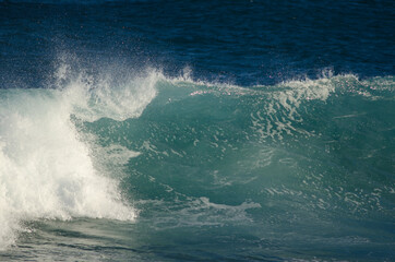 Wave breaking in the coast of Arinaga. Aguimes. Gran Canaria. Canary Islands. Spain.