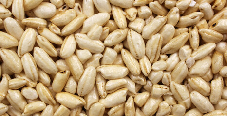 White puffed rice background with caramel