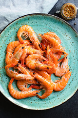 shrimp cooked prawn seafood ready to eat serving on a plate healthy meal snack ingredient top view copy space for text food background rustic diet pescetarian