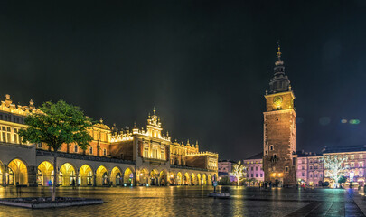 Fototapeta na wymiar Colorful Christmas Krakow. Old Market Square and City Hall Tower 