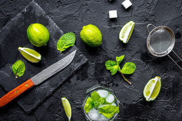 making mojito on dark background top view