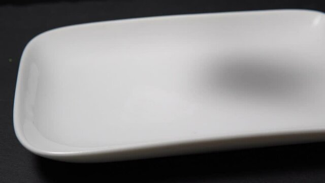 rolls and sushi in a Chinese or Japanese restaurant. wooden chopsticks