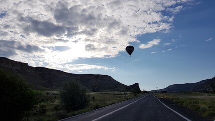 Hot air balloon in Cappadocia at sunrise. 