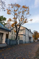 Quiet Riga cobblestone street in autumn