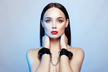 Pretty brunette Girl in handcuffs