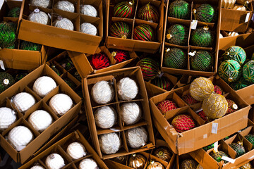 Сhristmas tree decorations in boxes. Christmas balls for the tree in boxes