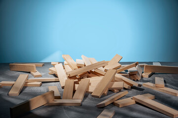 Randomly lying on the table wooden blocks for the game.
