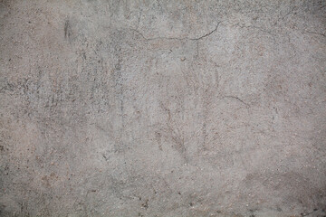 Gray concrete wall with cracks. Surface, material, texture, material for 3d.