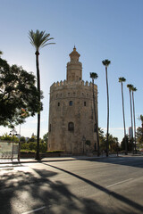 Fototapeta na wymiar The Torre del Oro is a dodecagonal military watchtower in Seville, southern Spain. It was erected by the Almohad Caliphate in order to control access to Seville via the Guadalquivir river.