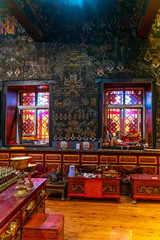 Fototapeta na wymiar The view inside the ancient old buddhist temple on Tibet