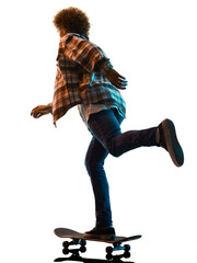 one caucasian young man skateboarder Skateboarding in studio silhouette shadow isolated on white background © snaptitude