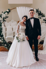 The newlyweds take an oath of allegiance to each other. Wedding in the White Hall.