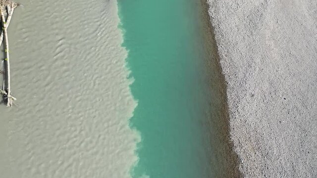 Water Color Mixing in Rivers Confluence. Aerial View of Landscape Scenery in Washington State, USA on Sunny Summer Day, Tilt Down Drone Shot