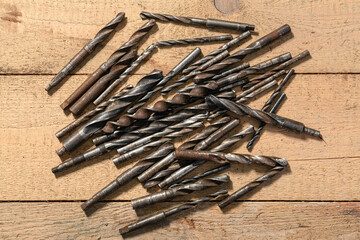 old vintage hand tools - set of drills on a wooden background