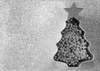 Christmas tree on white background. Holiday concept. Horizontal, empty copy space. iron box in the...