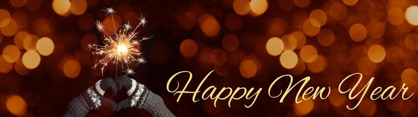 Silvester / Party / New Year background banner panorama - Happy girl / woman holds a sparkling...