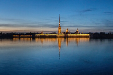 Fototapeta na wymiar View of the Peter and Paul Fortress after sunset. White nights in St. Petersburg.