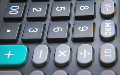 Black calculator keyboard. Closeup. Business