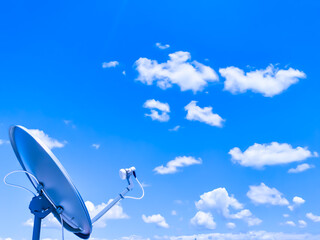 satellite dish against blue sky