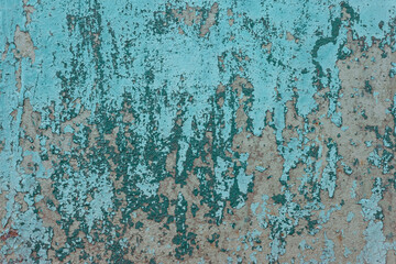 Fototapeta na wymiar rusty metal texture blue cracked paint of old wall