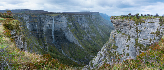 Autumn landscape at the Salto del Río Nervion in the Monte Santiago Natural Monument. Region of...