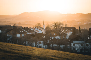 sunset behind a rural village